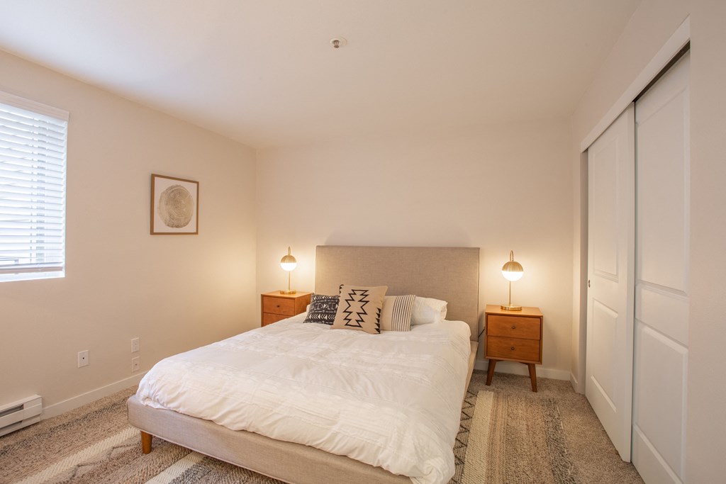 carpeted bedroom with window
