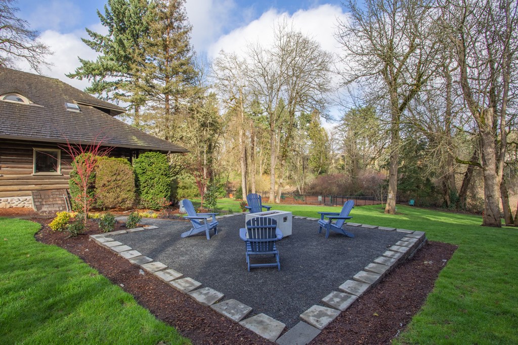outdoor lounge area with firepit