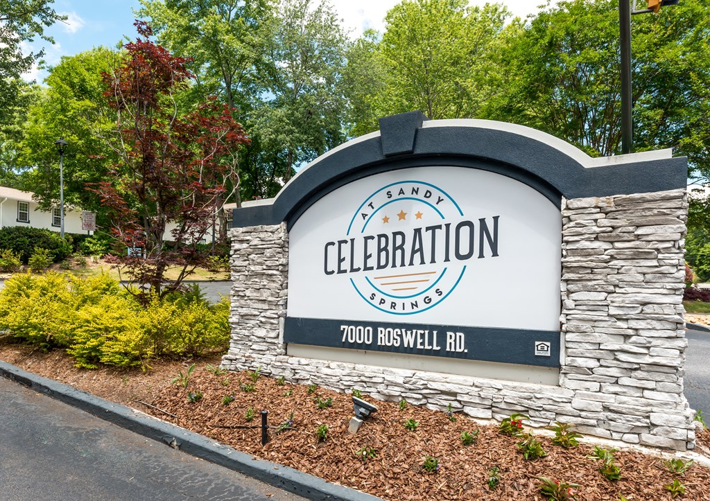 Pet-Friendly Apartments in Sandy Springs – Celebration at Sandy Springs -  monument sign