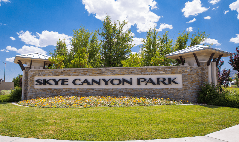 the sign at the entrance of the park