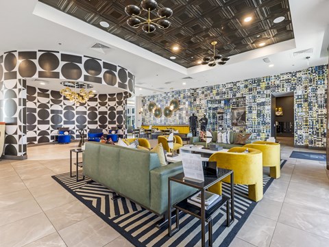 A modern living room with a zebra print rug and a yellow sofa.