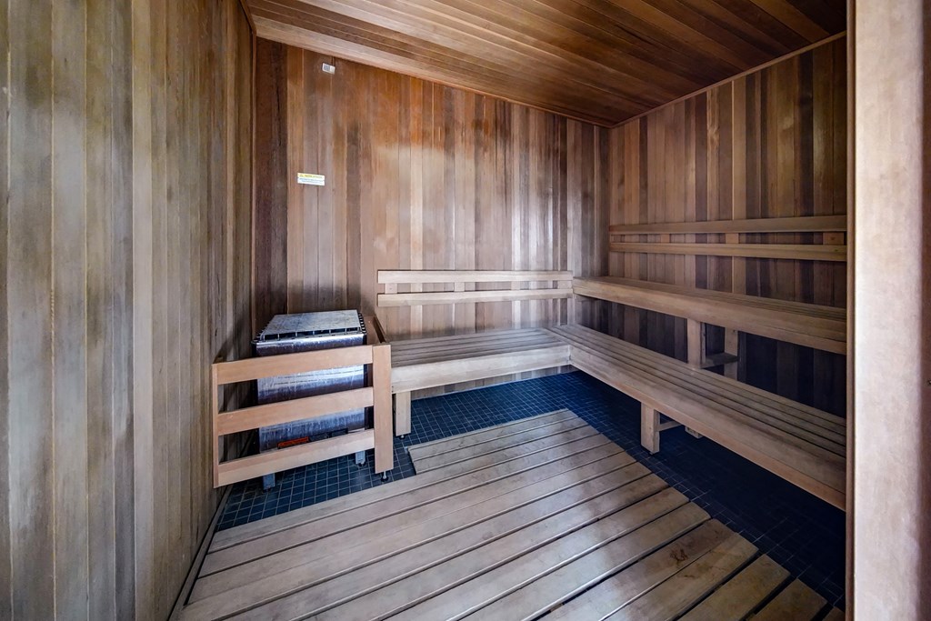 a wooden sauna with benches in it