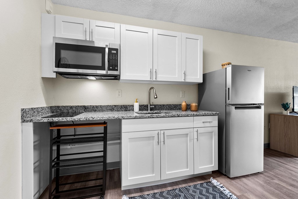 the preserve at ballantyne commons apartment kitchen with stainless steel appliances