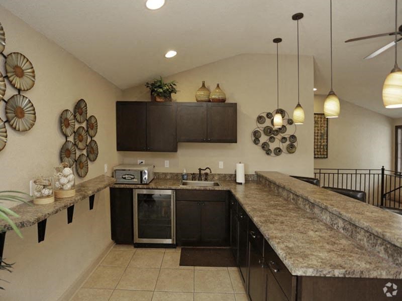 a kitchen with a counter top and a sink