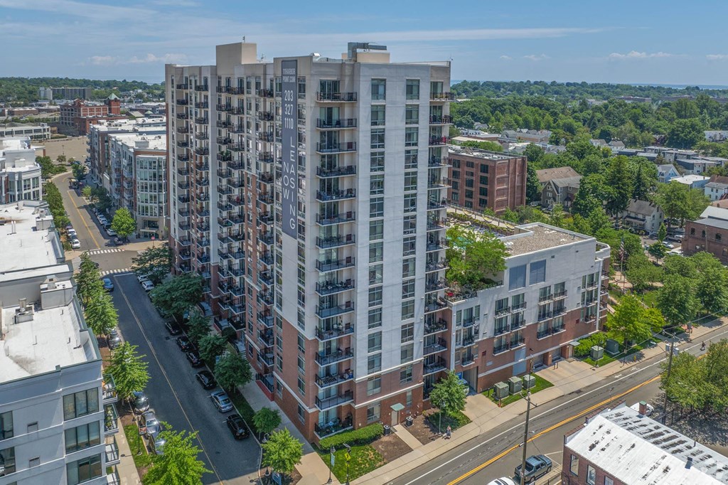 an aerial view of an apartment building in a city
