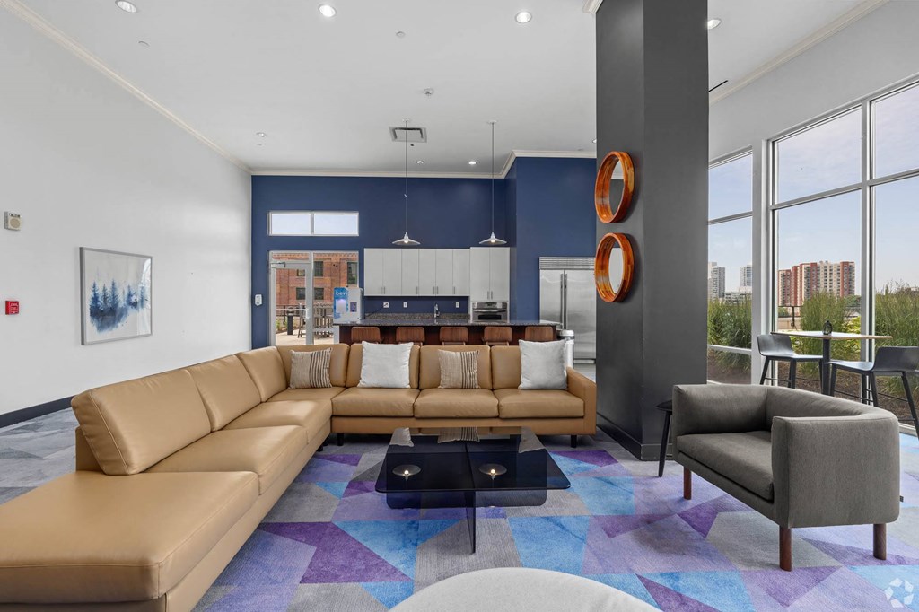 a living room with a couch and a table