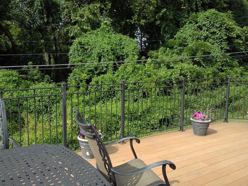 a patio with a table and a chair