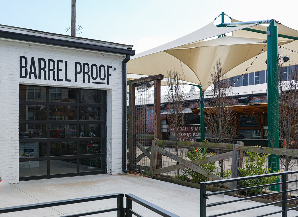 Exterior of Barrel Proof bar with outdoor seating area.