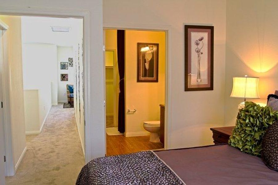 Bedroom with adjacent bathroom