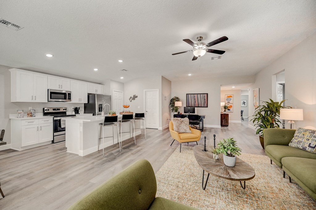 Open-concept floorplan at The Groves at Lake Ella in Lady Lake, Florida, a pet-friendly rental community.