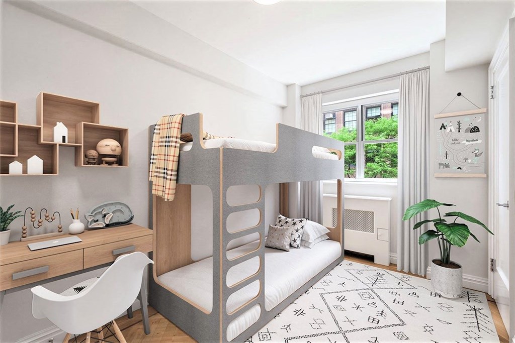 Luxury Apartments In Upper Eastside NYC For Rent - 85 East End Avenue - Bedroom With Hardwood Strip Flooring, A Ceiling Light, And Window