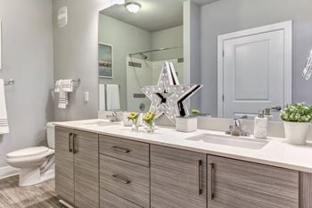 Renovated Bathrooms With Quartz Counters at The Ashley, Charleston, South Carolina