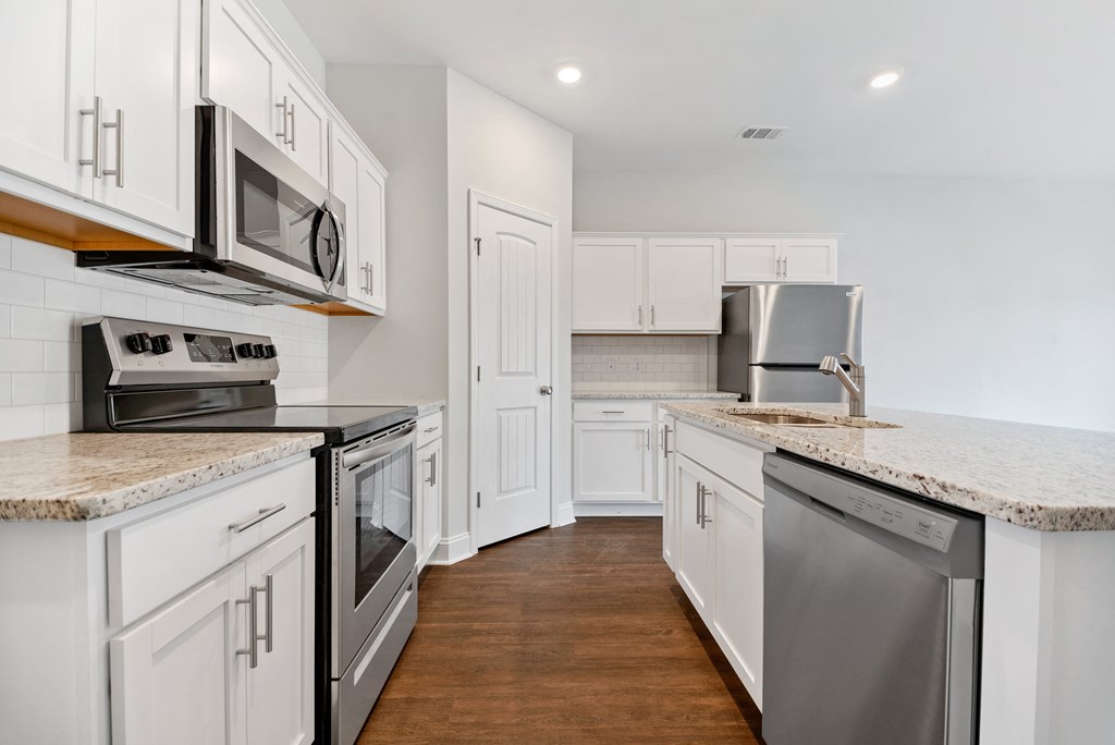 Cottonvale Towns in Savannah, GA photo of kitchen with stainless steel appliances