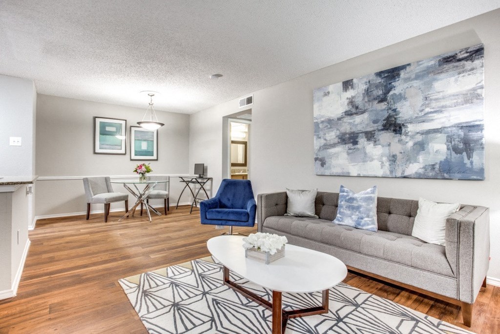 a living room with a couch and a table