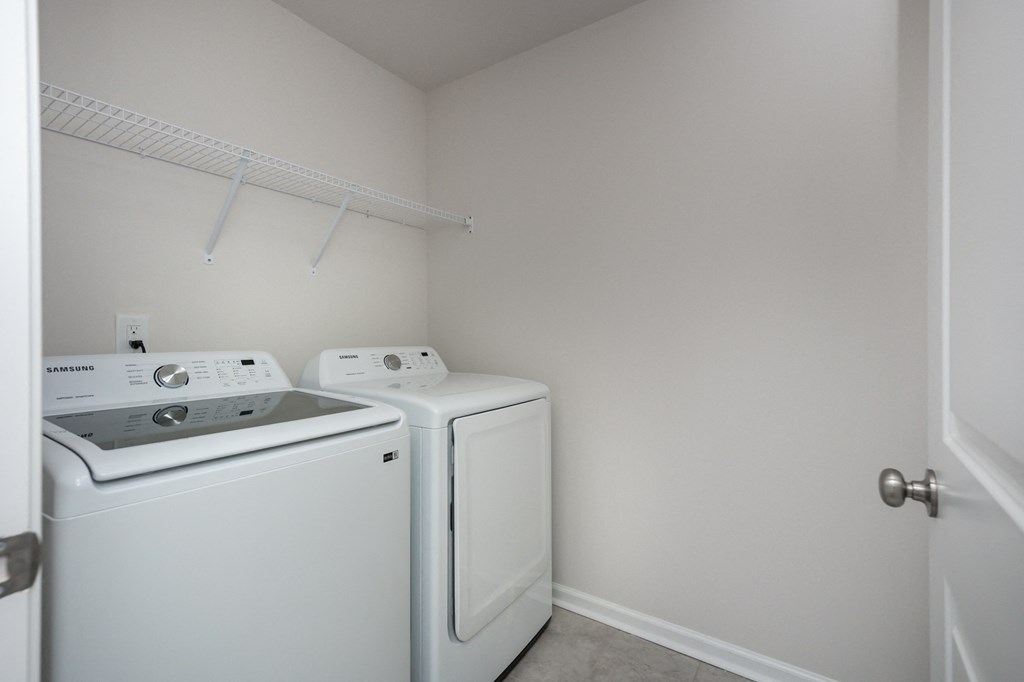 Pet Friendly Homes For Rent In Fountain Inn SC - Pine Ridge Place - Laundry Room With Washer And Dryer and Wide Shelf