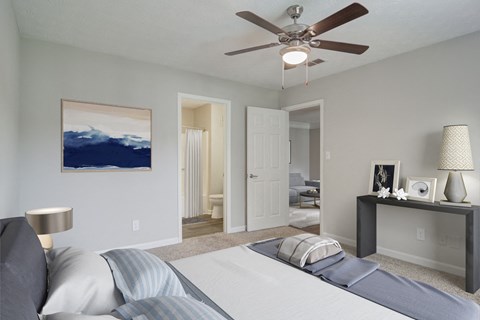 Bedroom with bathroom and carpet flooring at Place at Midway apartments in Douglasville near Lithia Springs, GA