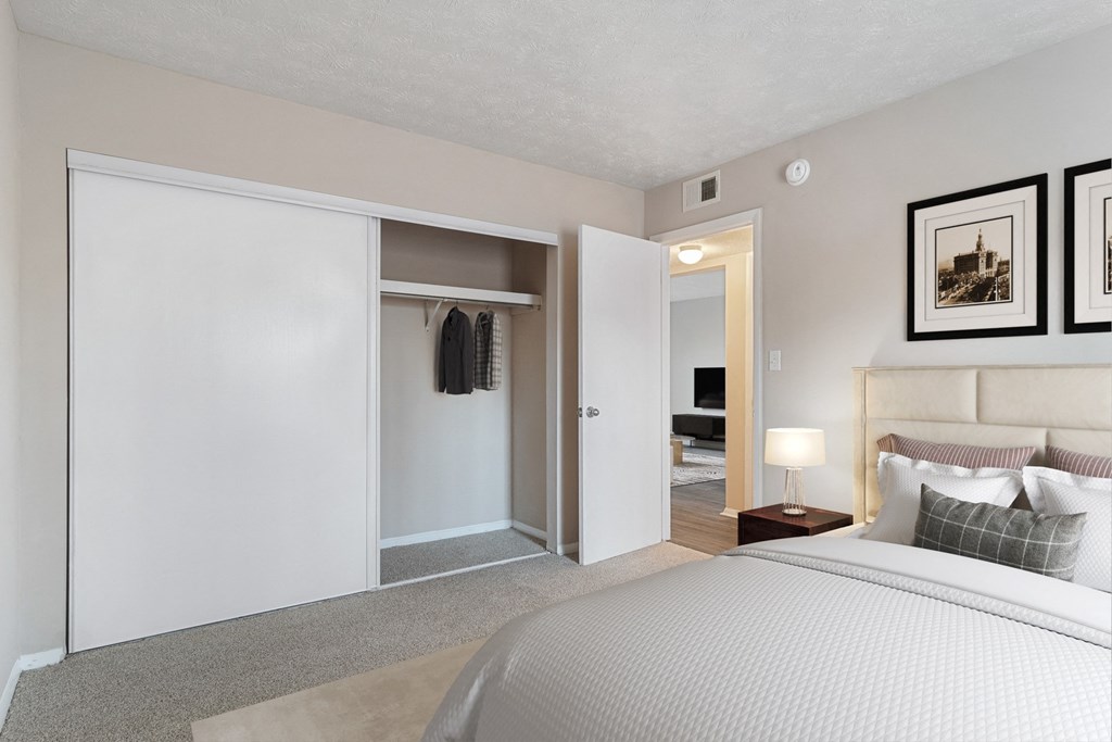 Bedroom with large sliding-door closet at Mableton Ridge Apartments in Mableton, GA, near Douglasville