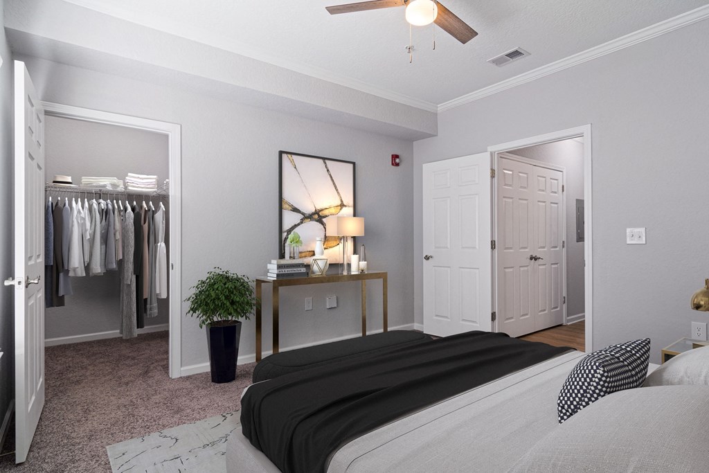 Soft plush carpeting in a bedroom at The Asher at Sugarloaf, a pet-friendly community in Lawrenceville, GA, near Duluth.