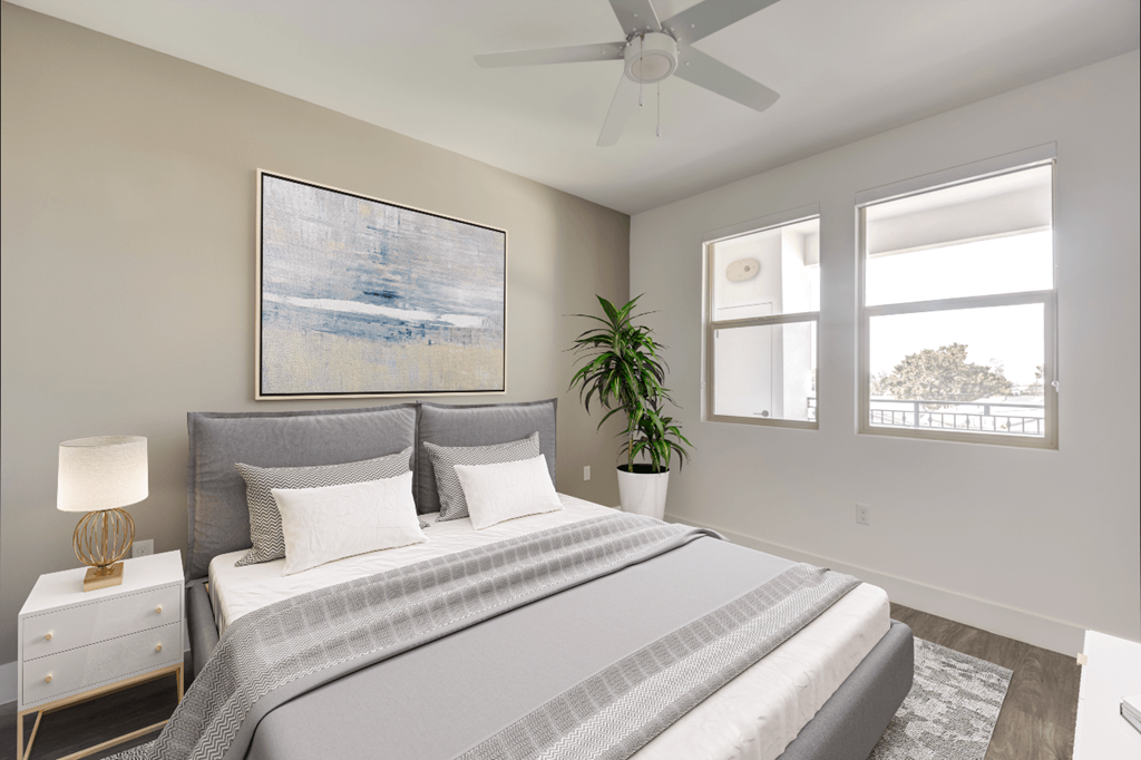 1 BR Apartments In Whitter, CA - Cierra - Spacious Bedroom With High Ceiling, Windows, Ceiling Fan, And Vinyl Plank Flooring