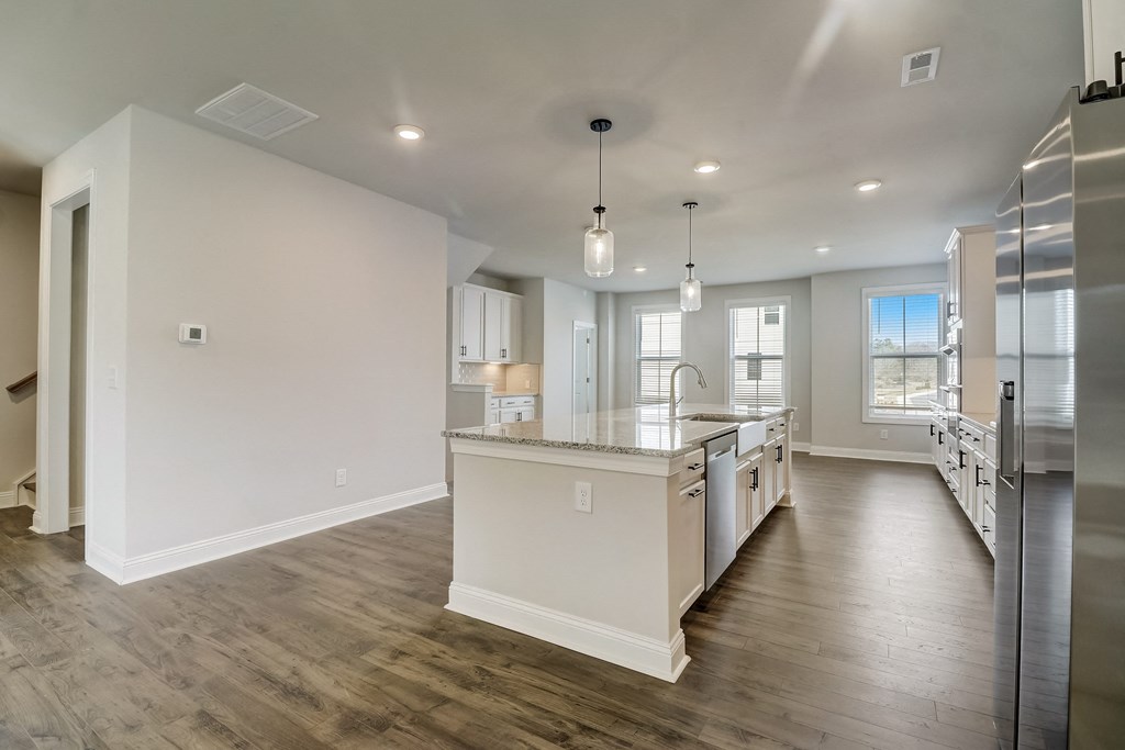 a kitchen and dining area in a new home