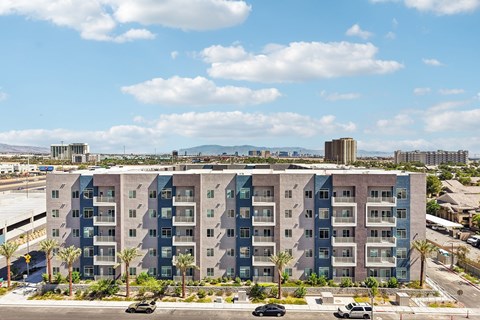 A large building with a lot of windows and balconies.