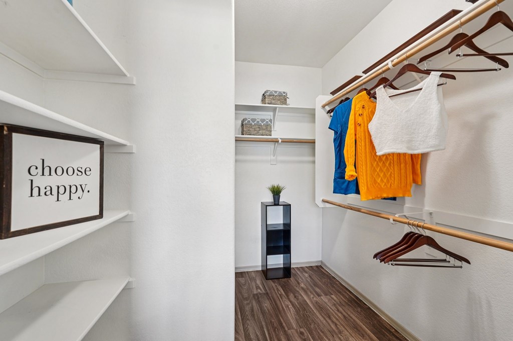 A small room with a sign that says choose happy.