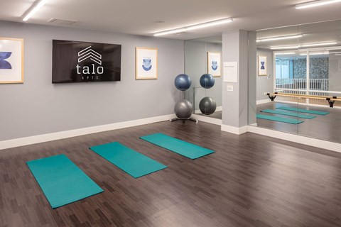 a room filled with furniture and a large window