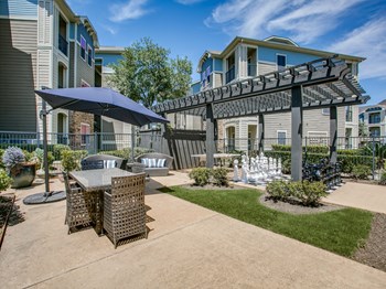barbeque grill area with covered tables - Photo Gallery 4