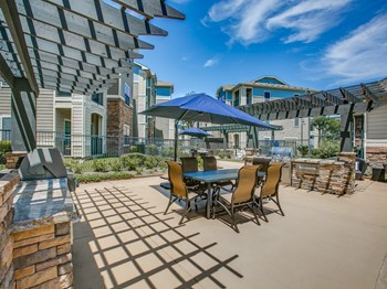 barbeque grill area with covered tables - Photo Gallery 5