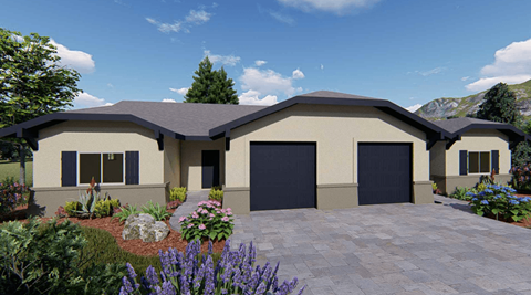 A modern house with a large front yard and a driveway.