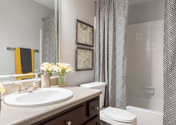 Avery Apartments in Jonesboro Georgia photo of bathroom with tub and shower