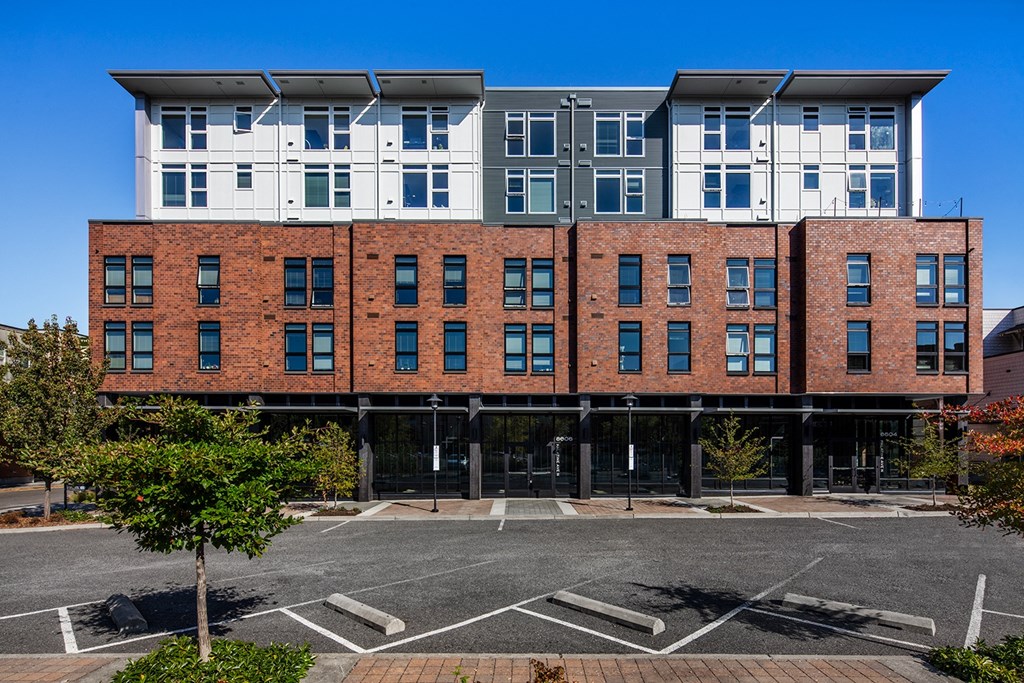Greenwood Apartments - Exterior View of The Morrow Apartments Building with Parking Access