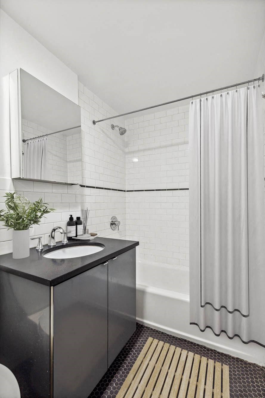 a bathroom with a sink and a bathtub