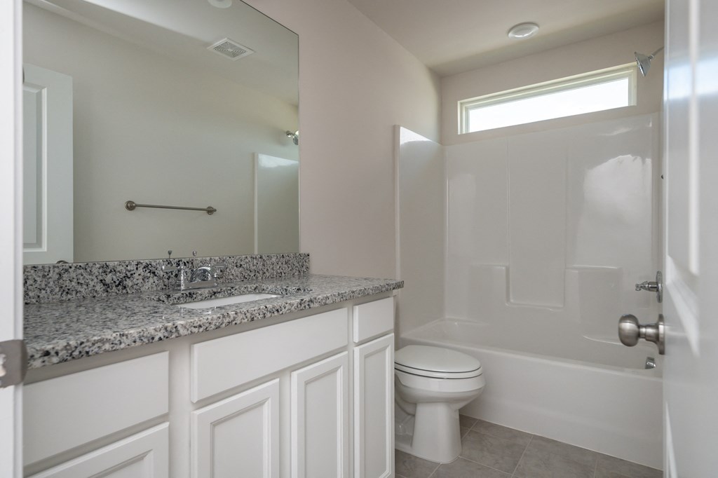 Fountain Inn, SC Single Family Homes For Rent - Pine Ridge Place - Bathroom with Granite Countertops, Shower and Tub Combo
