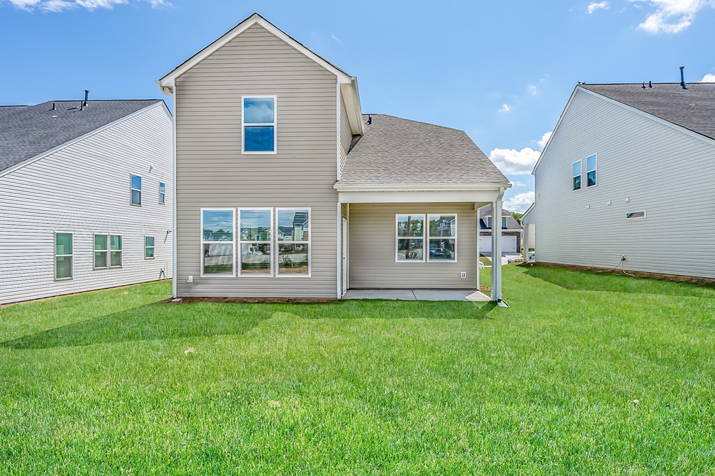 Fountain Inn, SC Houses For Rent - Pine Ridge Place - Back Yard Of House Surrounded By Lush Grass And Houses Side By Side