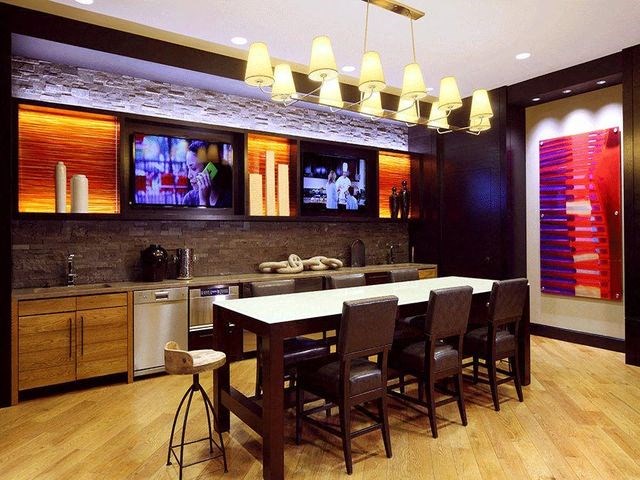 Communal kitchen with TVs and seating