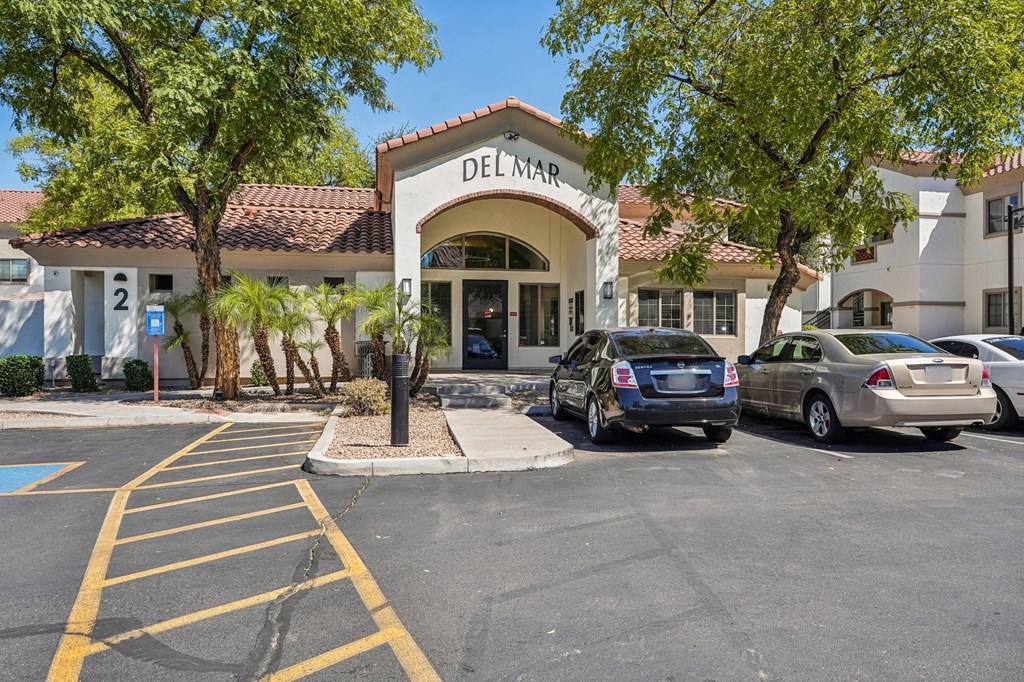 Cars parked in front of a Del Mar building.