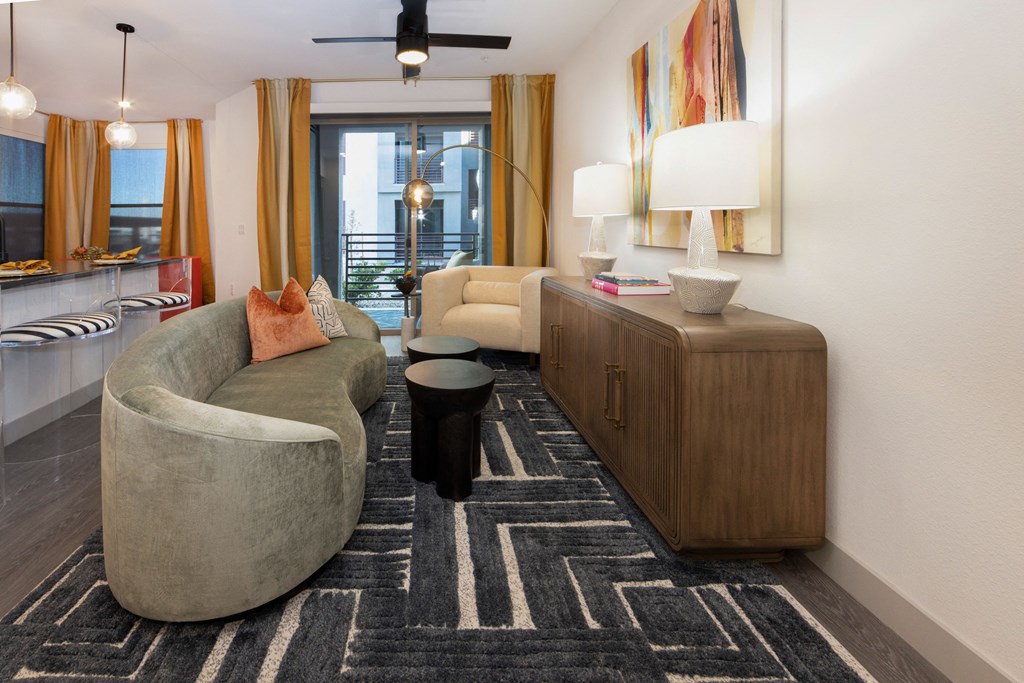 a living room with a couch and a table