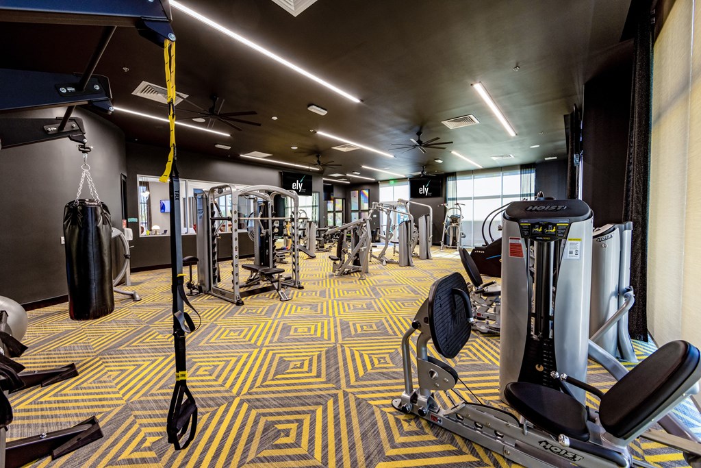 a fitness room with weights and cardio equipment at the renaissance valencia resort and spa