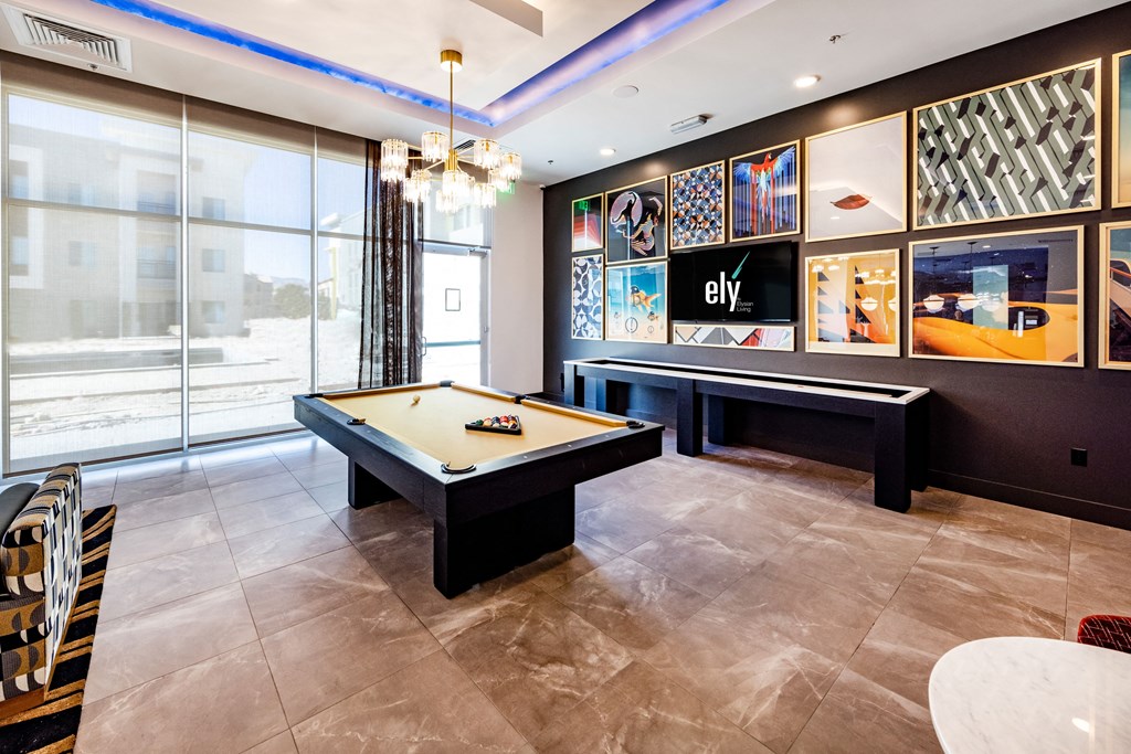 play a game of pool in our game room at our apartments in tempe
