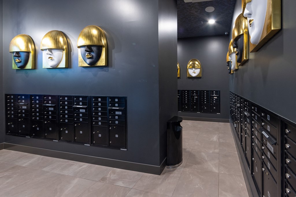 a display of wine racks in a wine cellar with gold helmets on the wall and