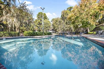 Greentree Apartments in Savannah Georgia photo of a swimming pool with trees in the background