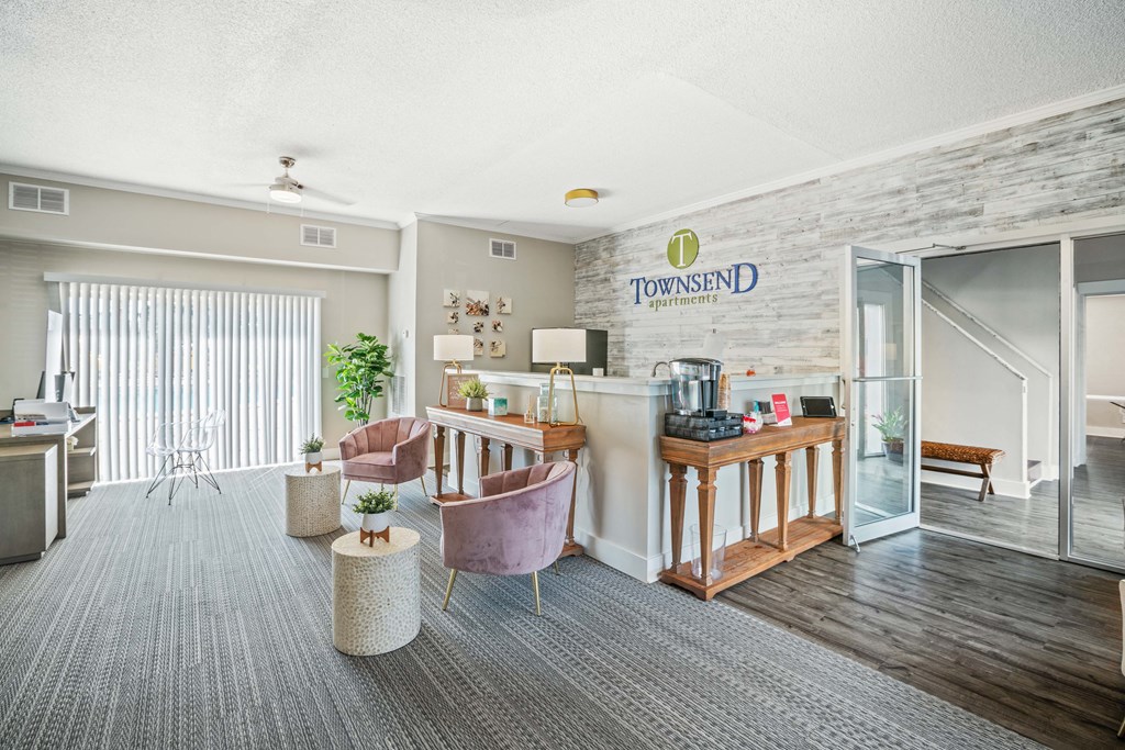 a lobby with a reception area and a reception desk