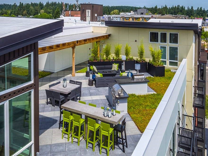 Rooftop patio with incredible views, fire-pit, barbecue grills, and lounge seating