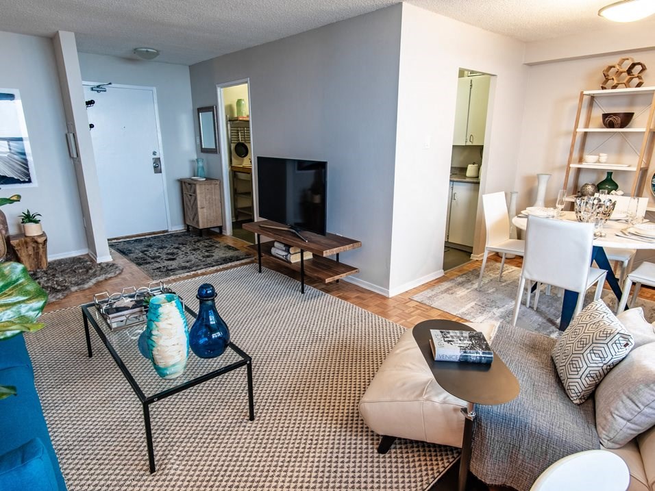 a living room with a couch and a table