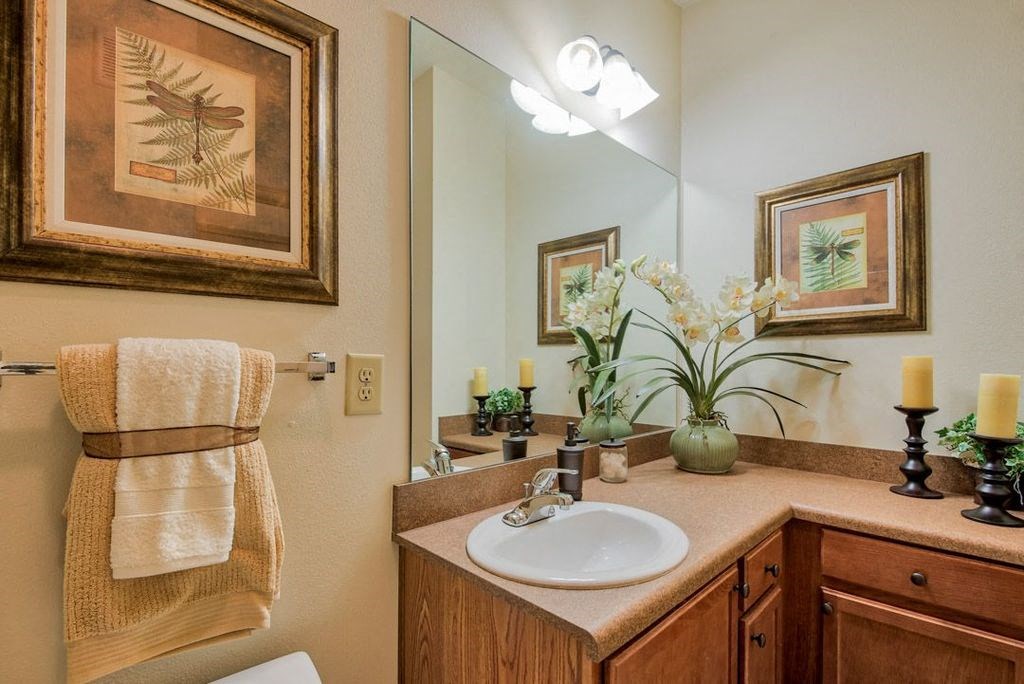 Pet-Friendly Apartments in Hinesville, GA – Tattersall Village - bathroom with long vanity and toilet