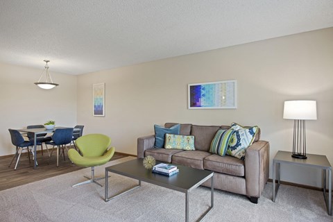 a living room with a couch and a table