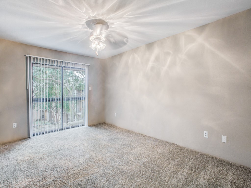 Magnolia Terrace apartments in Houston Texas 77082 photo of bedroom with large window