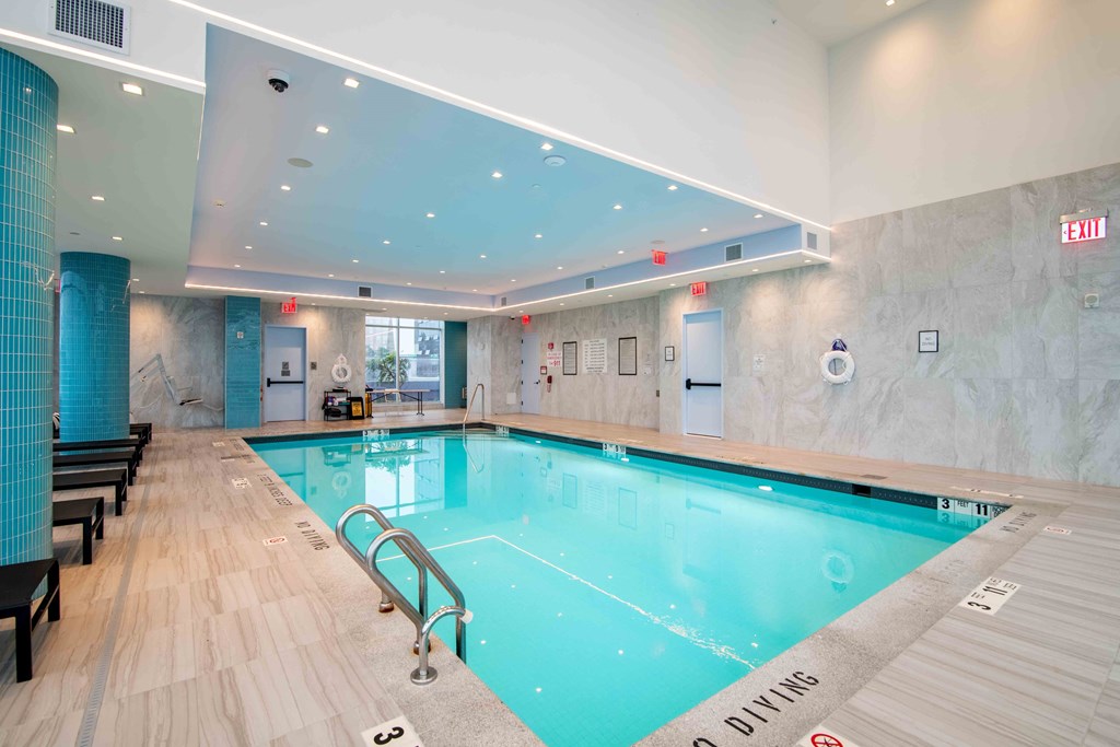 a swimming pool in the lobby of a hotel