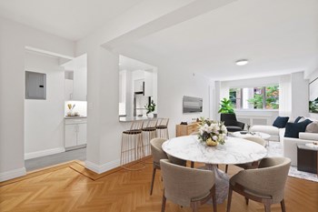 Luxury Two-Bedroom Apartments in Upper East Side New York - Open-Concept Dining Room with Ample Natural Light and Wood-Inspired Flooring - Photo Gallery 5
